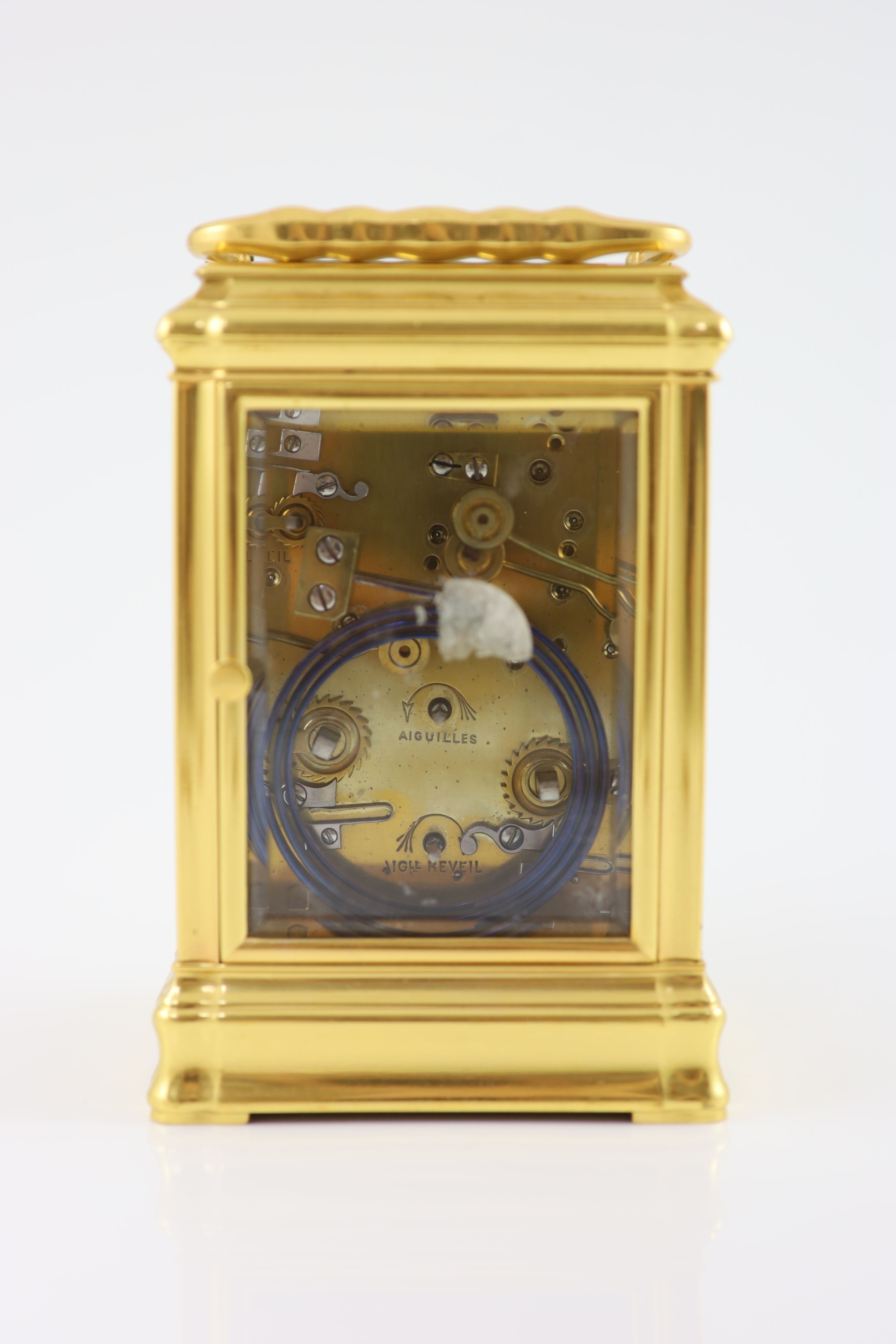 An early 20th century French quarter repeating Grand Sonnerie carriage alarum clock H 15cm. W 9.5cm. D 8.5cm.